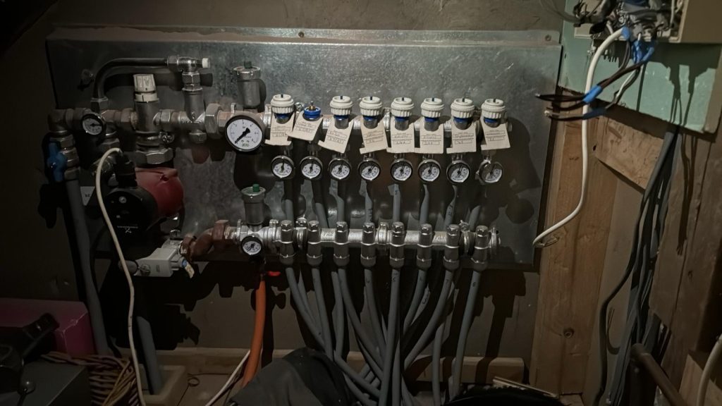 An underfloor heating system in a dark room